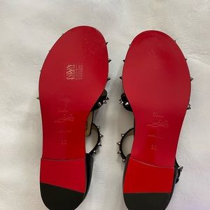 Never worn. CHRISTIAN LOUBOUTIN Black  Flat Sandals.